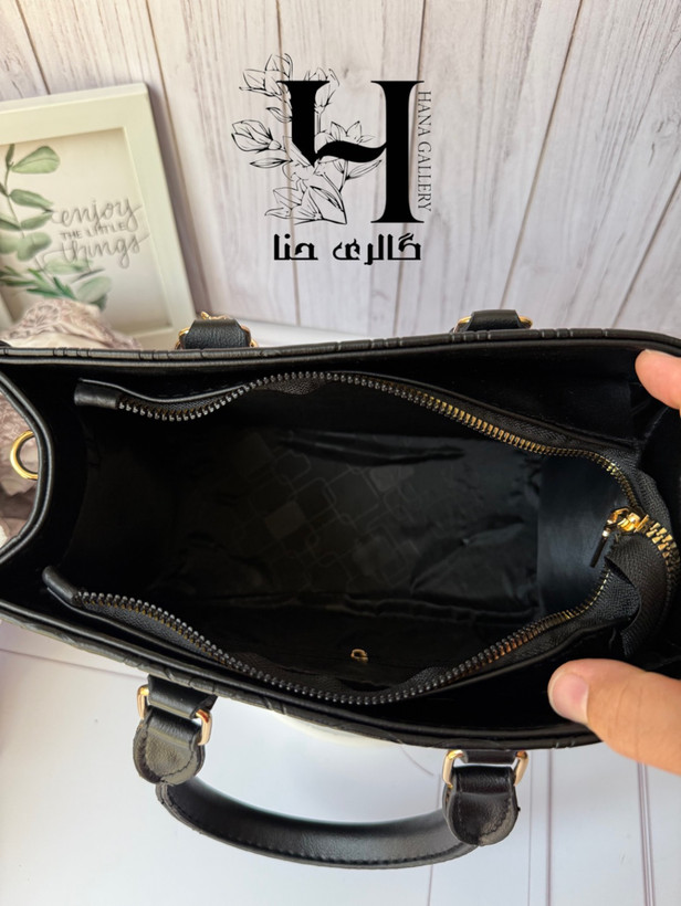 کیف کوچ سرمهای برجسته با آویز آلبالو